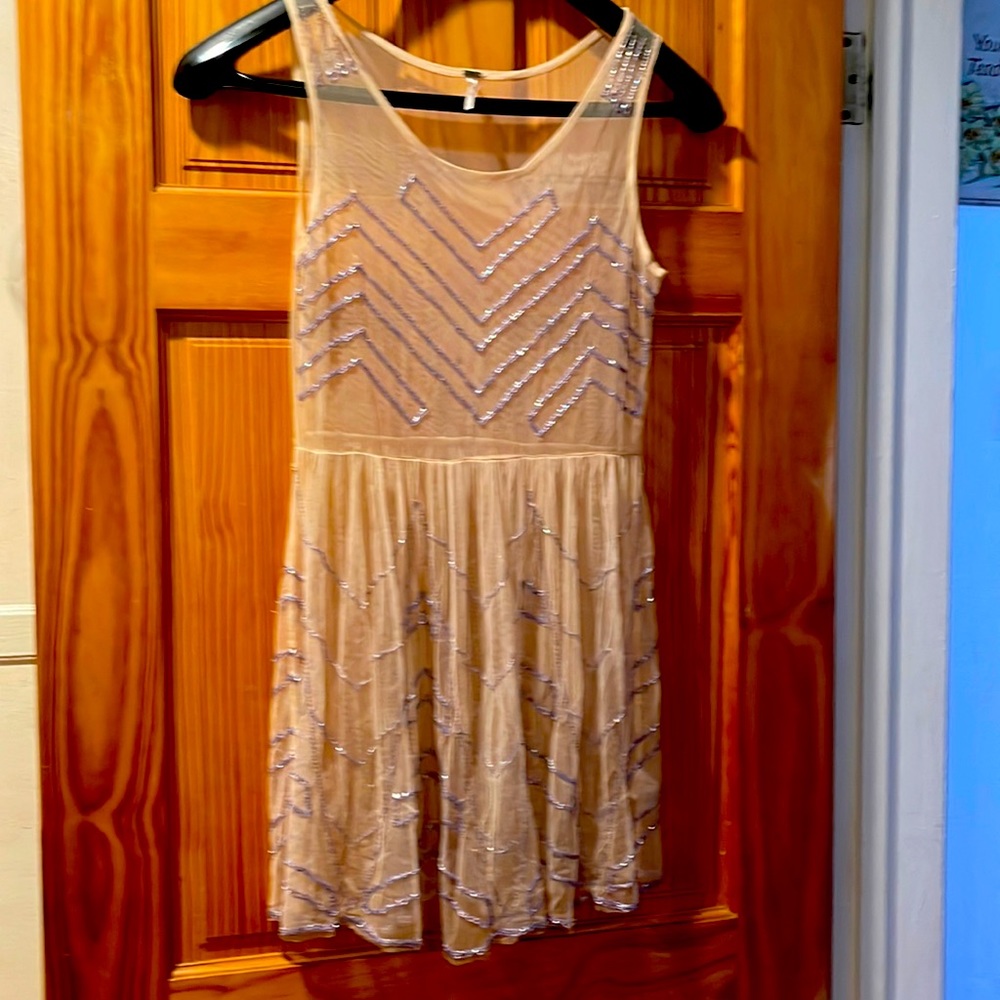 Sheer medium size dress with purple sequins